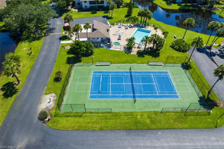 Aerial view of a large body of water and a pool area