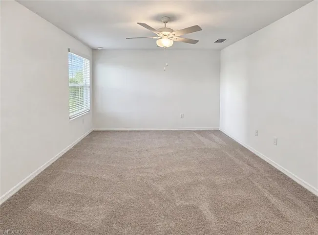 Neutral-toned carpeting throughout