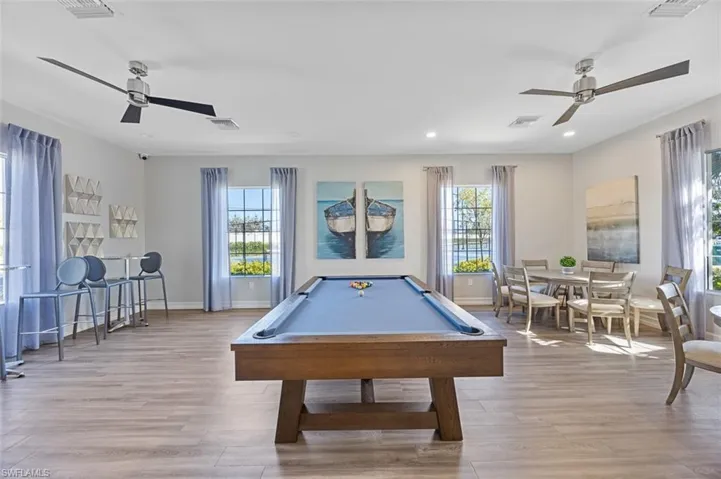 Rec room with ceiling fan, billiards table, light wood-style flooring, and recessed lighting