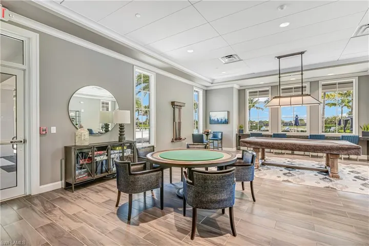 Rec room featuring billiards table, ornamental molding, and recessed lighting