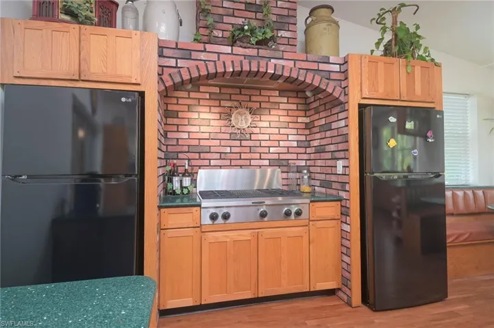 Gas Cooktop with Brick Decor Accent!  (2) Refrigerators!