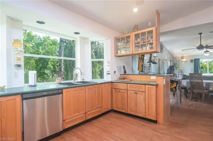 Wood Cabinetry!  Solid Surface Counter Tops!