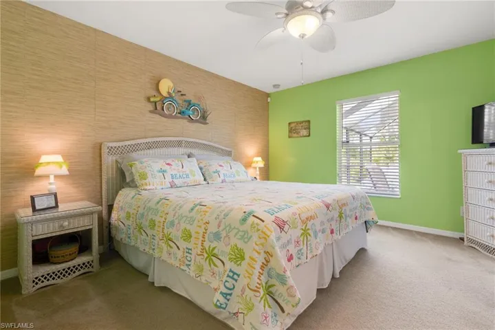 Bedroom with carpet flooring and ceiling fan