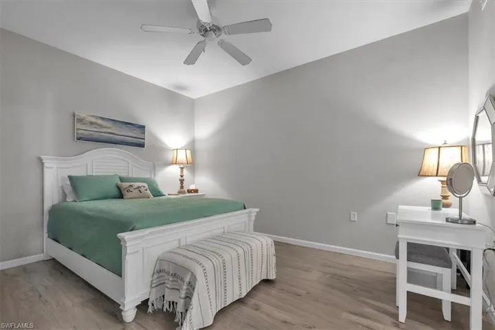 Owner's suite with plank flooring