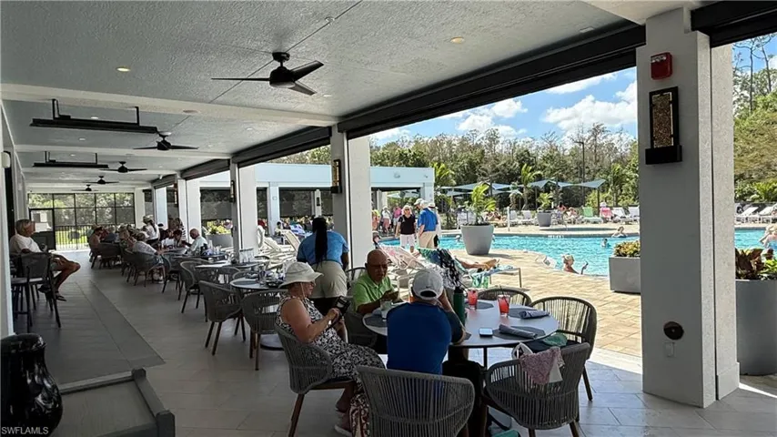The Oasis lanai seating by pool