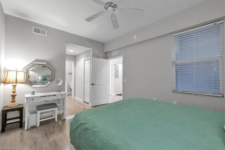Owner's suite with plank flooring