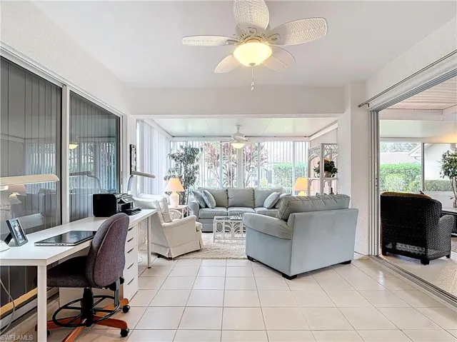 3rd bedroom w/pullout sofa and curtains/den