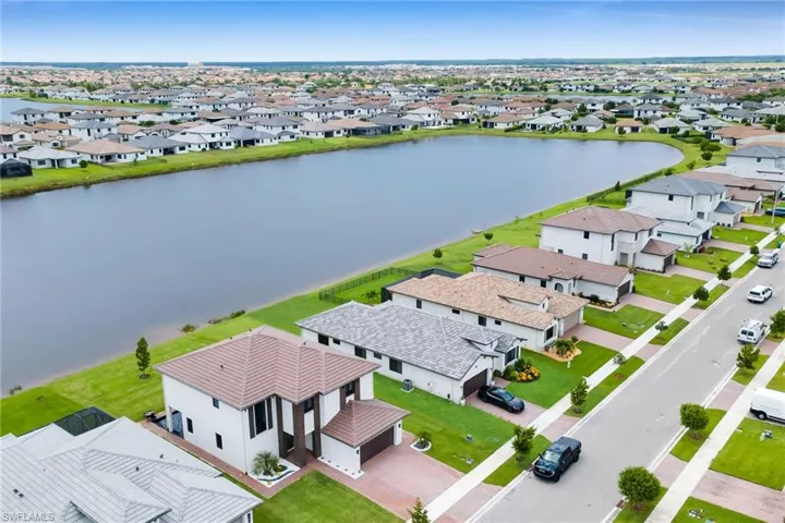 Expansive lakefront community featuring multiple contemporary residences