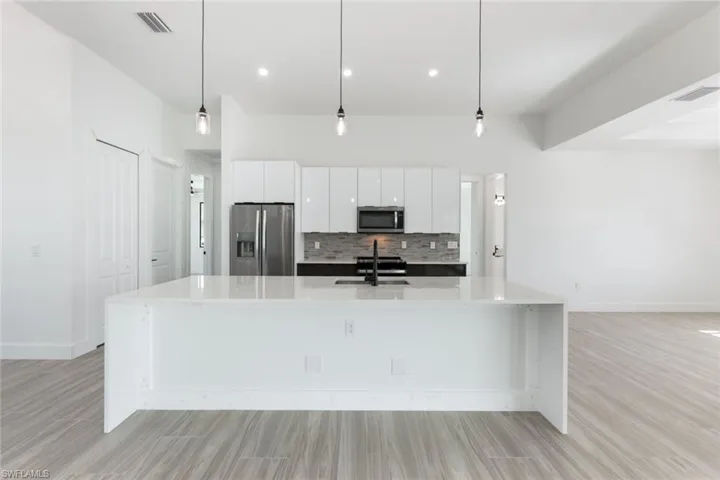 306 NW 13th  ST, Cape Coral, FL 33993