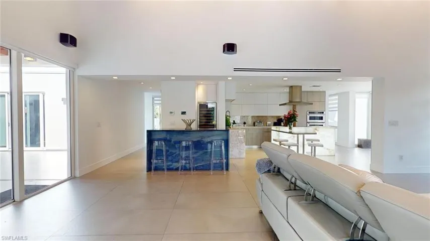 Living room featuring light tile patterned flooring
