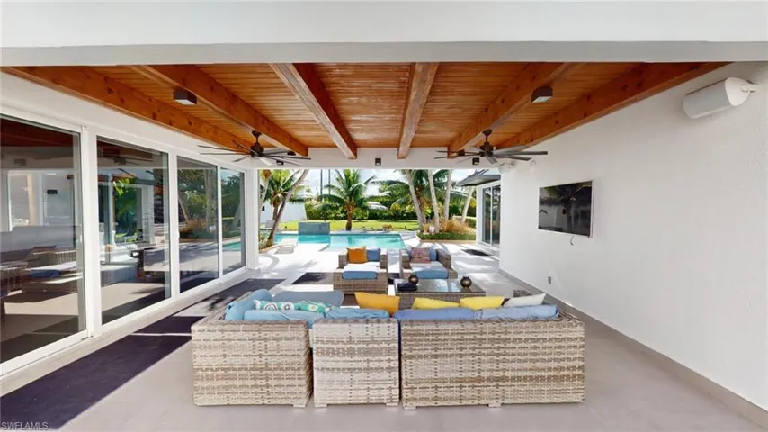 View of patio featuring ceiling fan and outdoor lounge area