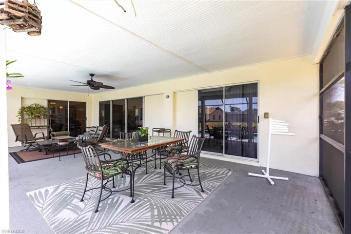 View of patio / terrace with a ceiling fan and outdoor dining area