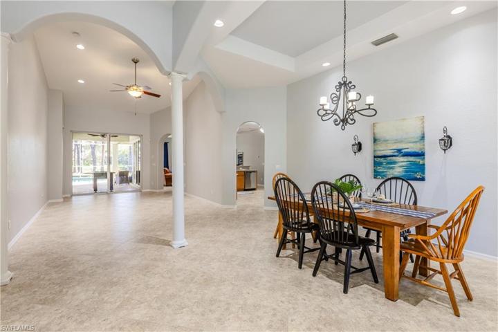 Large Living and Dining space with vaulted ceilings and recessed lighting
