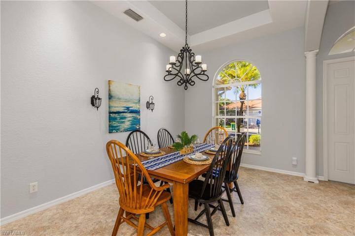 Dining space with tray ceiling and space for the whole family around the table