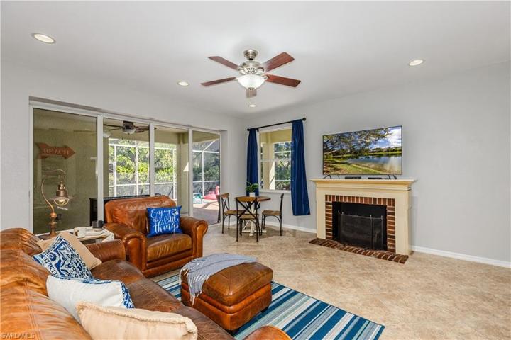 Family room has 4 panel pocketing slider