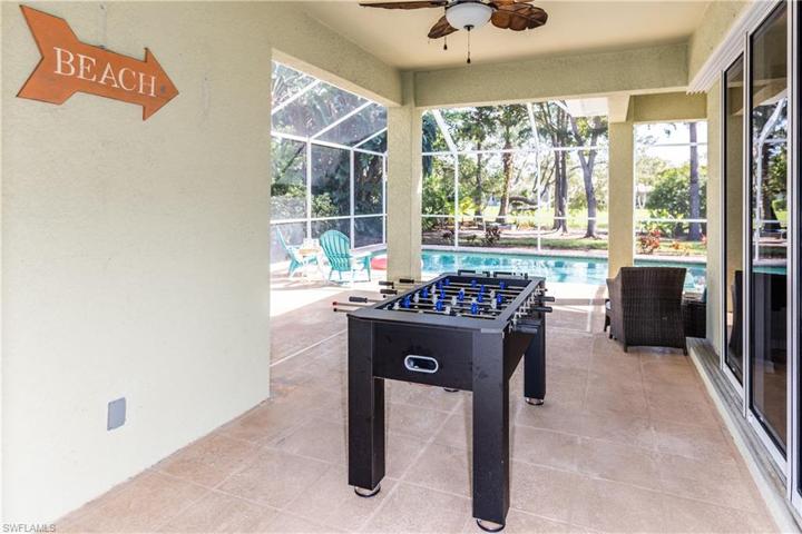 Screen lanai has covered space for lounging, dining or playing