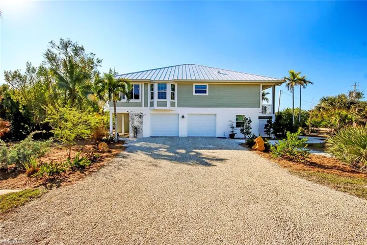 View of front of house with double garage