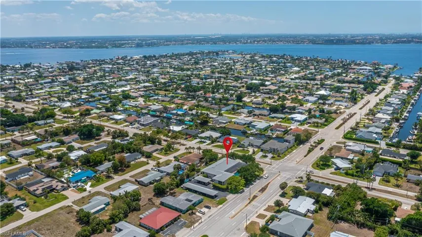 Aerial perspective showcasing a residential area with extensive waterways