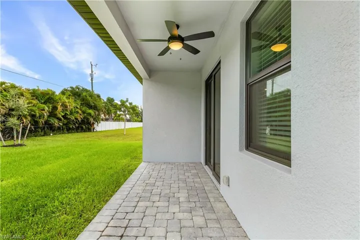 View of patio with ceiling fan