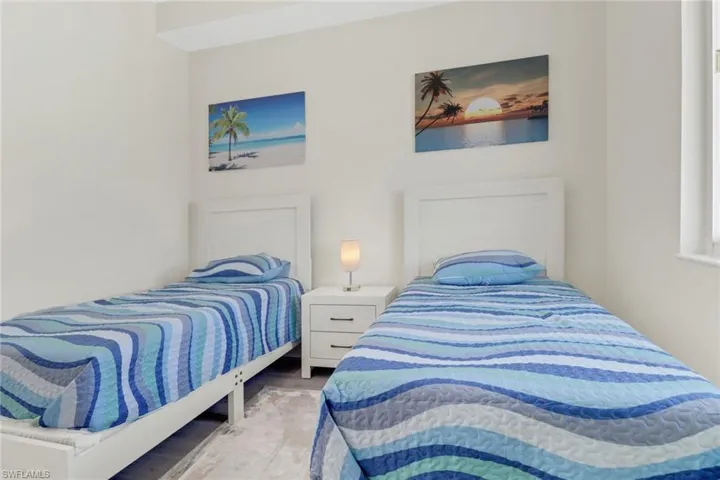 Double the Florida fun with this bright cherry guest suite.