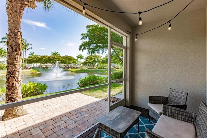 View of patio / terrace with a water view
