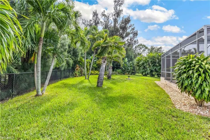 View of yard featuring a lanai