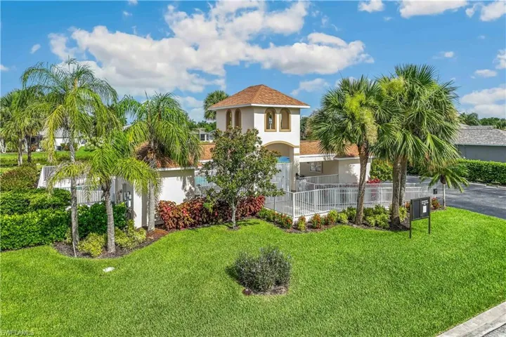 Mediterranean / spanish house featuring a front lawn