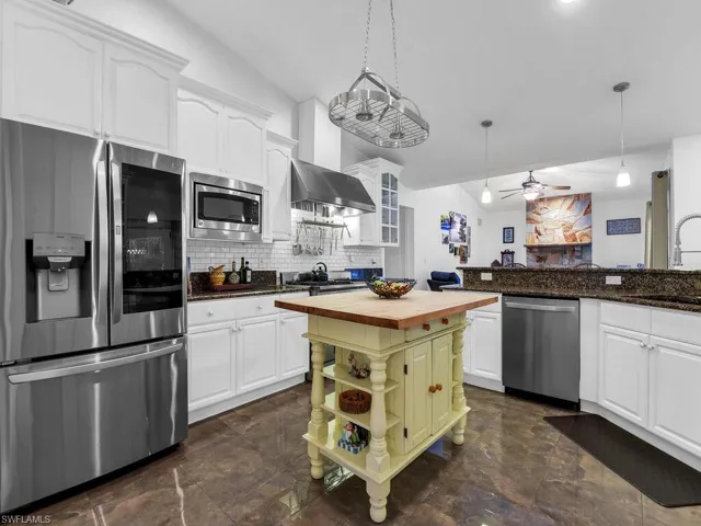 Spacious Kitchen - real wood kitchen cabinets & 50 gal gas heater installed in 2024.