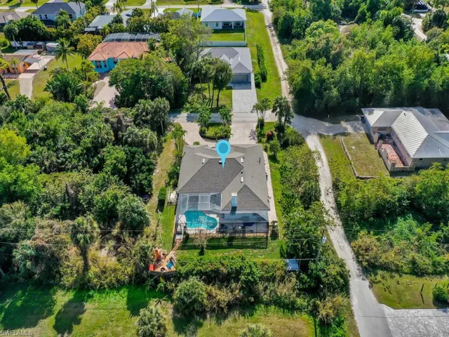 Rear View Of Property - Privacy Hedges and Trees Surrounding