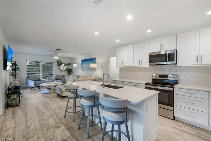Kitchen offers ample storage.