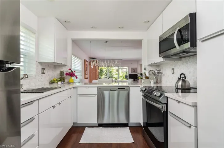 Kitchen with stainless steels appliances Photo taken before owner moved out.