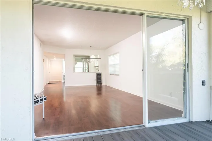 View from Lanai to Living-Dining Room + Kitchen