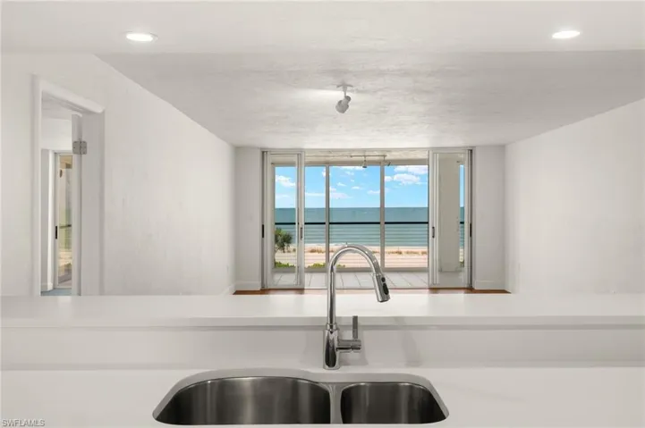 Kitchen view of a sink and nearby water