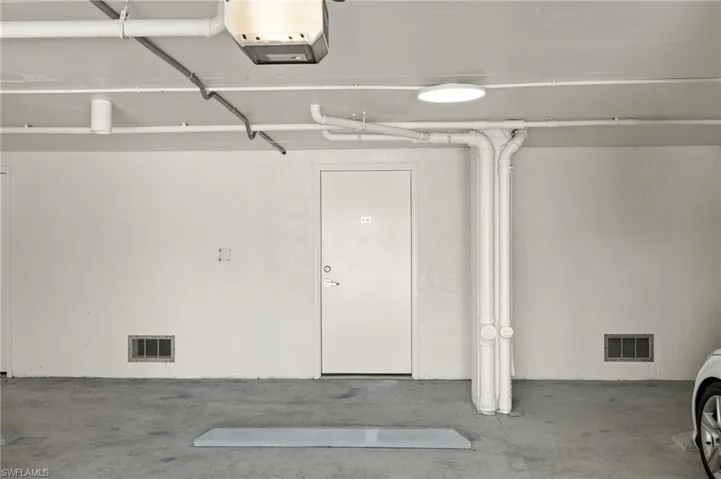 Parking garage featuring a garage door opener