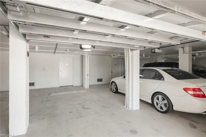 Parking garage with a garage door opener