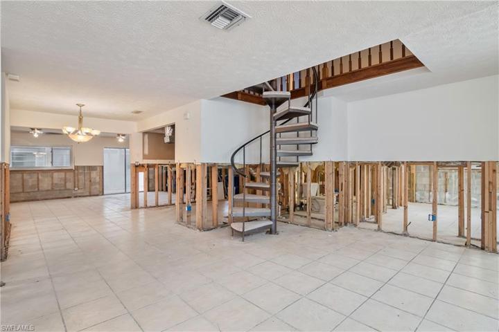 Spiral Staircase to Upstairs Secondary Owner’s Suite