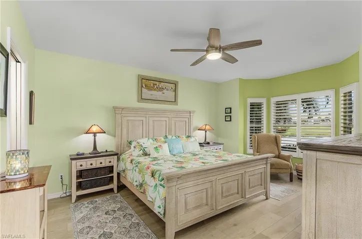 Master bedroom has extra bay window for lounging, working or just enjoying gazing out to the golf course. Plantation shutters are NEW! Furniture is included.
