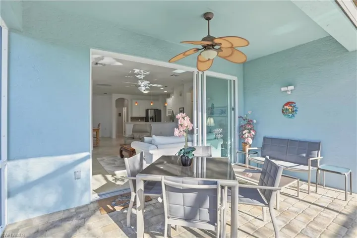 View of patio / terrace featuring a ceiling fan and outdoor dining space