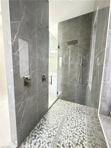 Bathroom with a tile shower