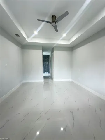 Spare room featuring ceiling fan