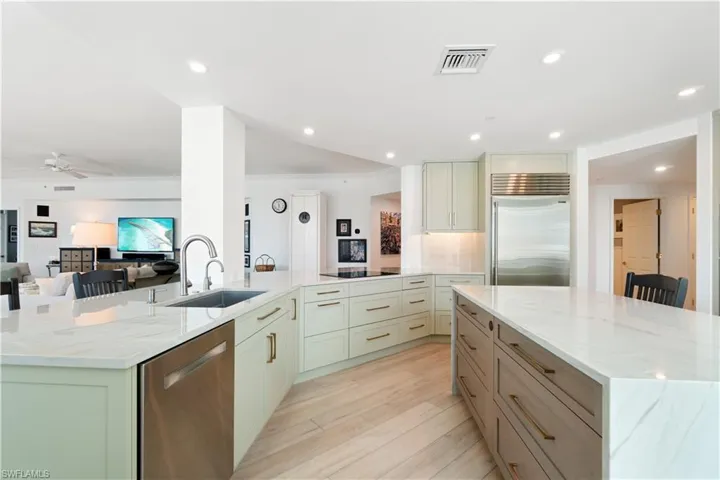 New cabinets, Quartz water fall countertops and high end appliances such as Sub-zero, Wolf, and Bose