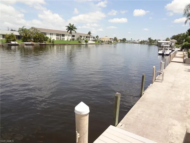 View of dock featuring a water view of WIDE RUBICON CANAL (GULF ACCESS)