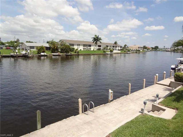View of dock featuring a WIDE water view