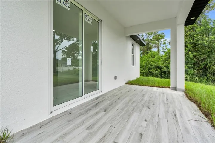 Wooden terrace with a patio