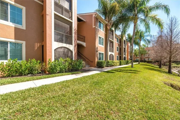 Rear view and sidewalk of condo building
