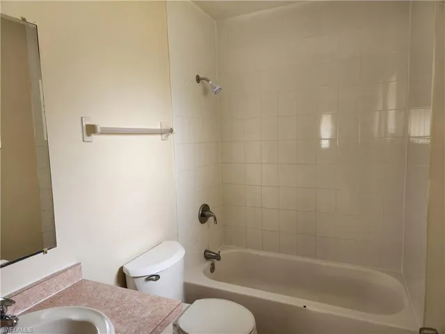 Full bathroom featuring bathing tub / shower combination and vanity
