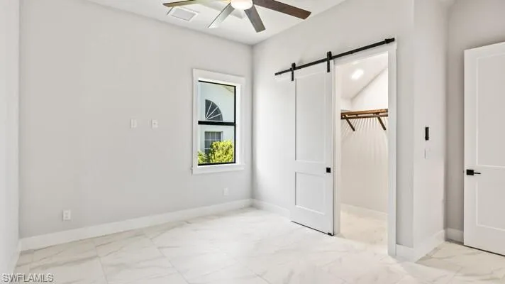 Guest bedroom 2 on main floor with large closet with under stair storage.
