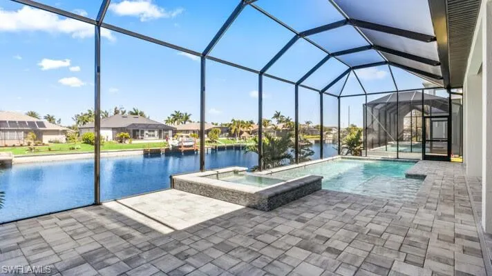 Pool and spa with gulf access canal view