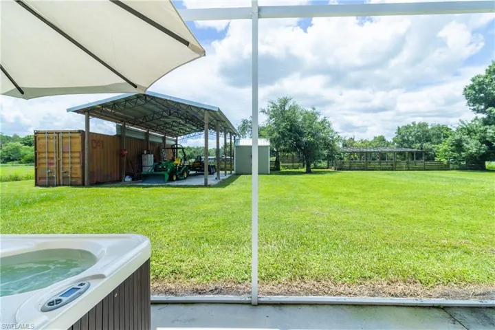 View of yard featuring a hot tub