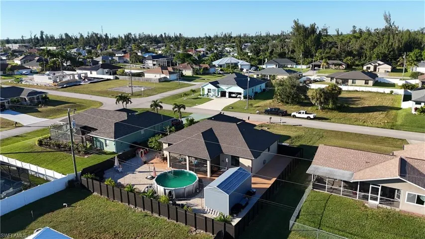 Aerial view of residential area with a pool